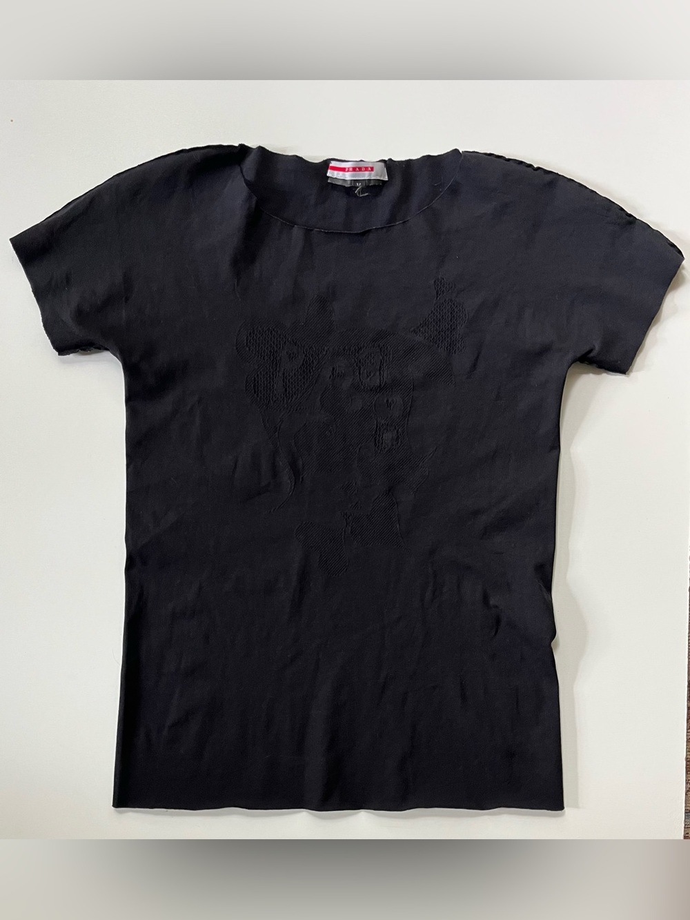 Prada black high stretch techno top with embossed hearts logo. Sz M